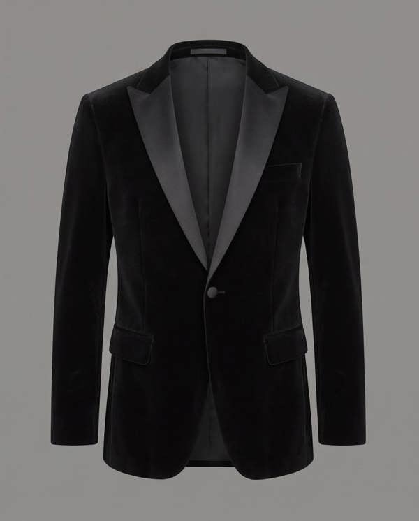Black velvet tuxedo jacket on a gray background