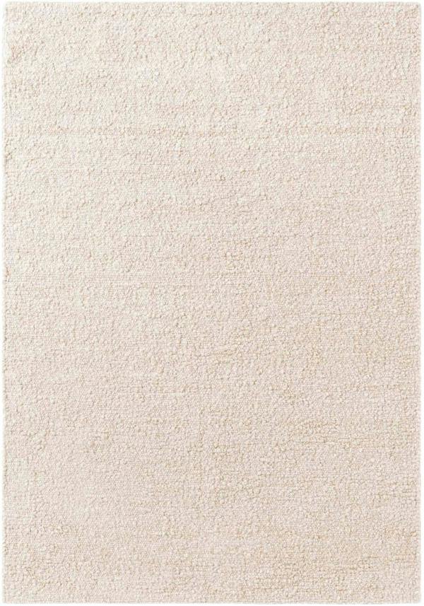 Beige area rug with a textured pattern