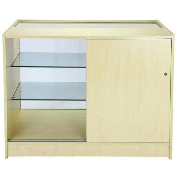 Light wood Comet Counter Set with a sliding glass door, two glass shelves, and a sleek, modern design for display and storage