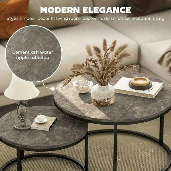 Round nesting coffee tables set with dark cement-style marbled tops and black metal frames