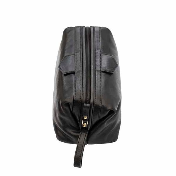 Top view of Black leather washbag on a white background