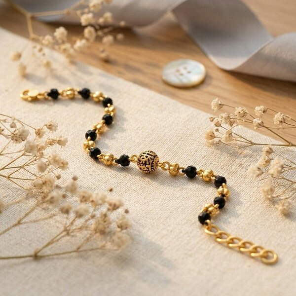 The Colourful Aura Gold Plated Black Faceted Bead Engraved Centre Charm Kids Nazaria Bracelet