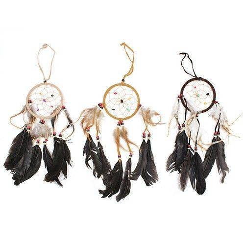 Medium round dreamcatcher with cream hoop, black feather fringe, and beaded web details