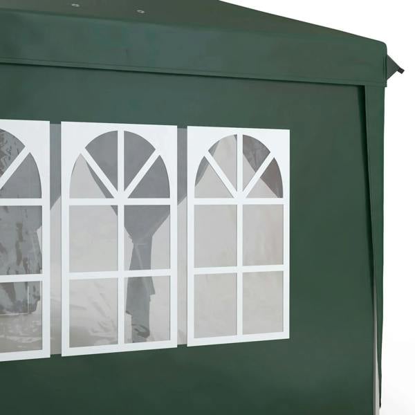 Dark green gazebo wall panel with white-framed window sections