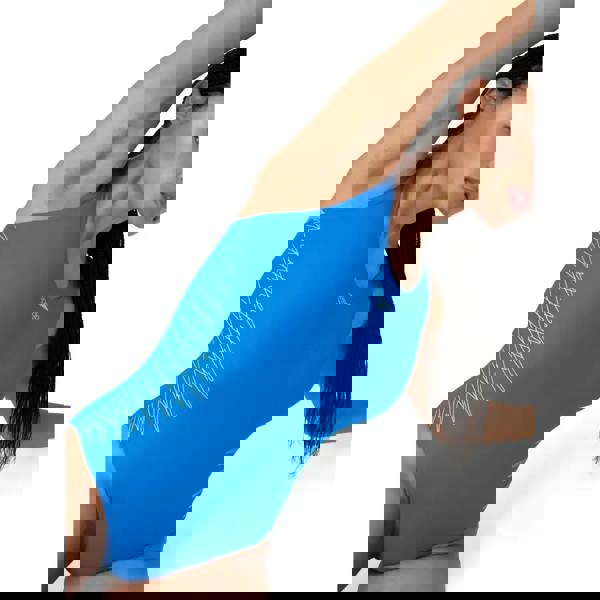 Blue Speedo placement muscleback swimsuit with white wave pattern