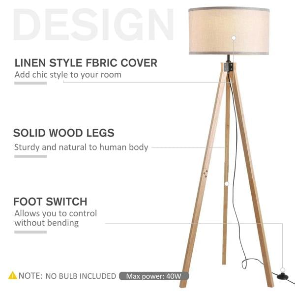 Beige fabric floor lamp with light wood legs, black base, and visible foot switch