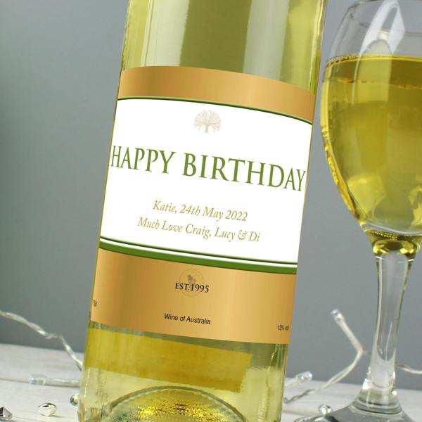 Close-up view of a custom gold label on a bottle of Personalised White Wine reading HAPPY BIRTHDAY.