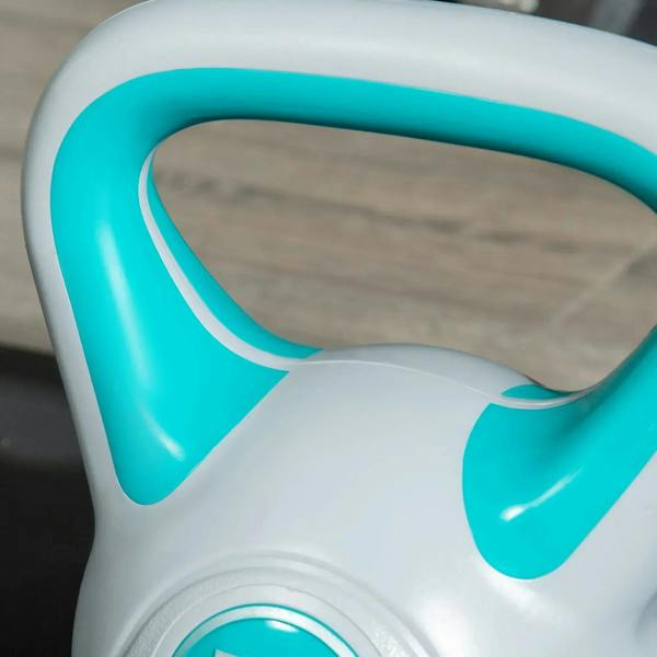 Close-up of light blue handle and grey shell on a 10 kg kettlebell.