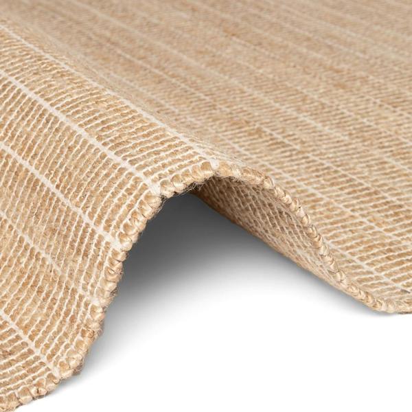 Close-up of a roll of brown paper with textured surface