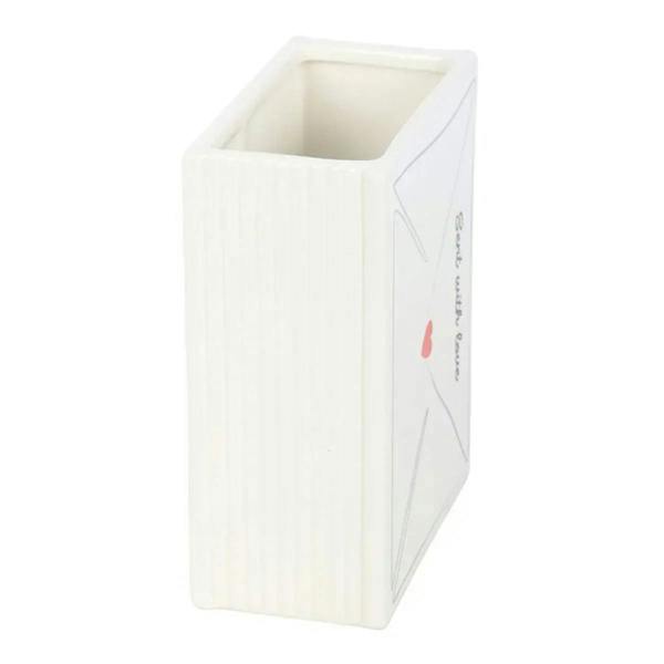 White ribbed envelope-style vase with red heart and “Stay with me” on side