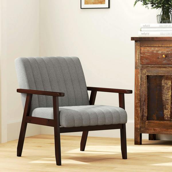 Grey accent chair with wooden armrests and cushioned seat, side view