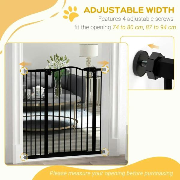 Black pressure-fit dog gate with adjustable width and mounting adjustment screws