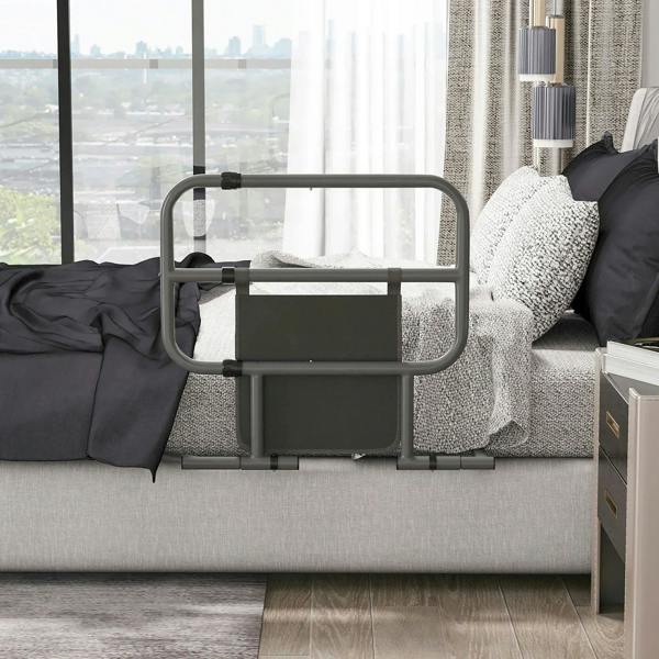 Black bed assist rail installed on a sofa bed, with front storage pocket panel.