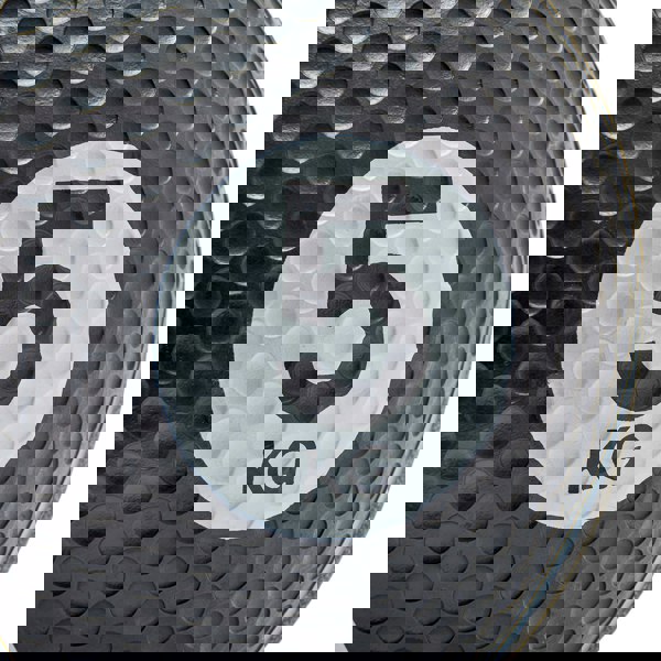 Black medicine ball with '5 KG' marking on a white background