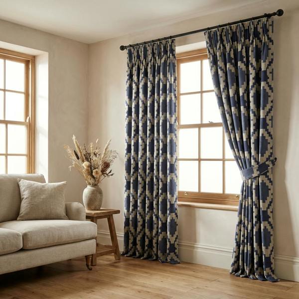 Omni made-to-measure curtains in Navy, styled in a living room
