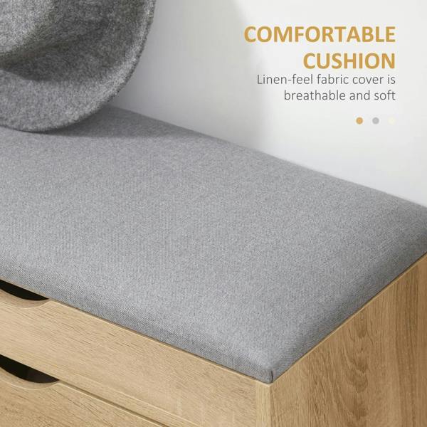 Gray cushioned seat on a natural wood shoe storage bench with drawer openings