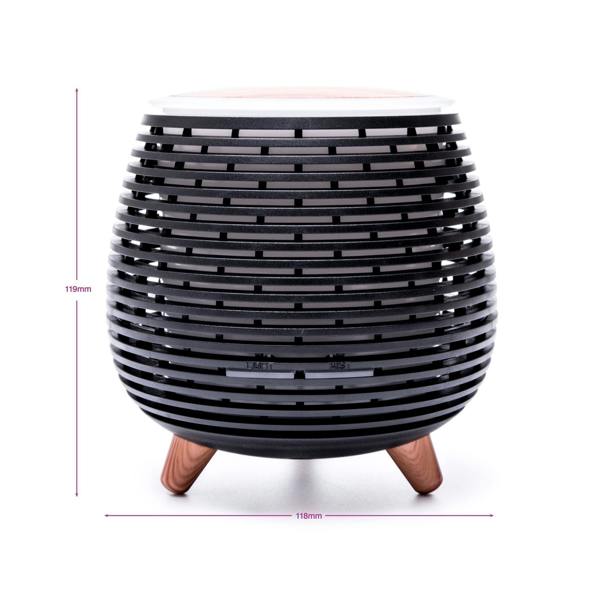 The Rio ZOEY Aroma Diffuser, Humidifier & Night-Light features a round, black striped design with wooden legs. Measuring 119mm high and 118mm wide, it’s perfect for relaxation and creating a peaceful atmosphere anywhere. Shown on a white background.