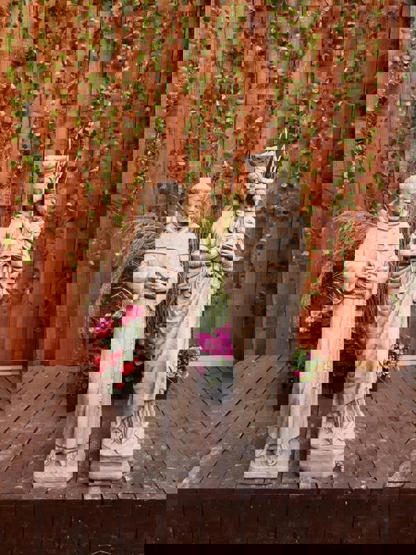 Stone Cast statues of Mary with Child and St Francis