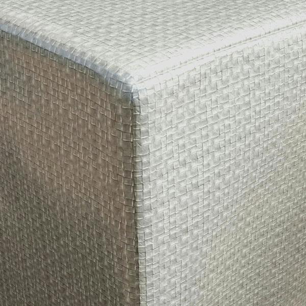 Grey patio furniture cover corner with textured weave and reinforced stitched edge.