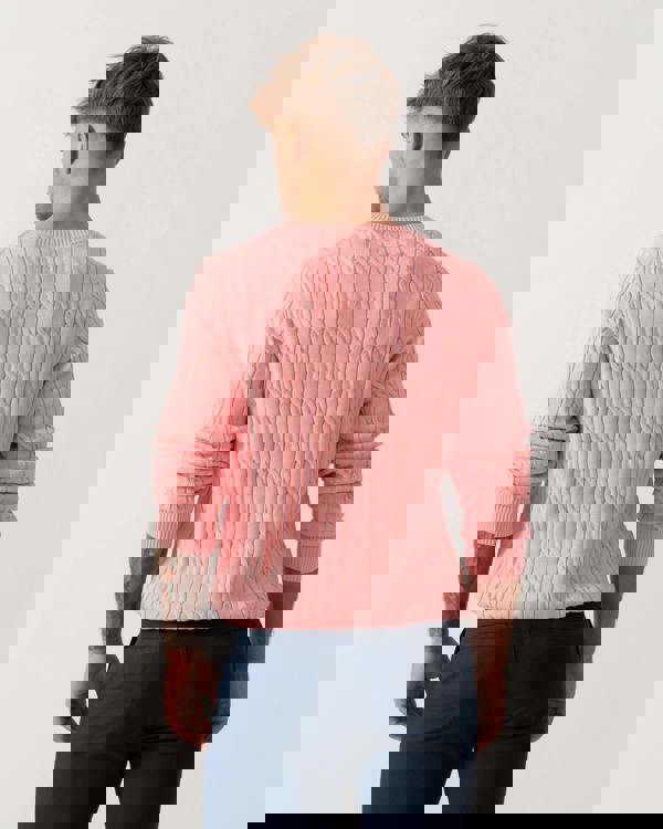 Man wearing GANT Mens Cotton Cable Knit Crew Neck Jumper in 666 Washed Pink - Back