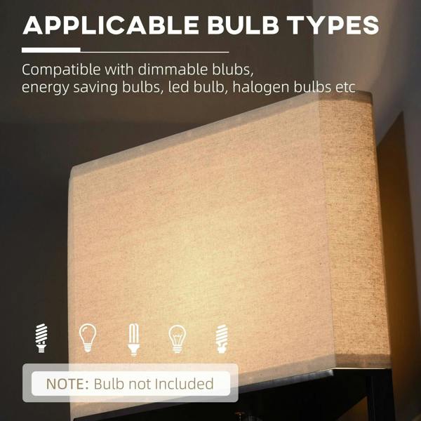 Beige fabric lamp shade for a tall corner floor lamp with black shelves