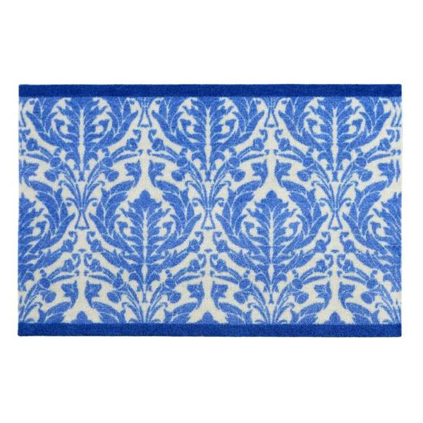 Blue and white patterned rug on a white background