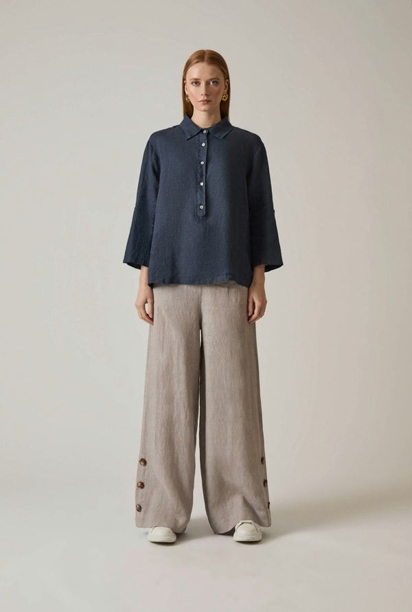 Navy linen blouse with button front and roll tabs