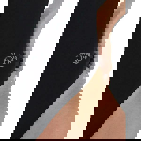 Black Simply Swim fin with logo beside Classic Thinstrap swimsuit