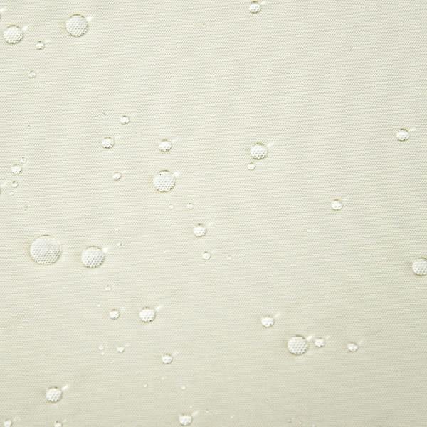 Cream white woven cushion fabric with visible water-bead droplets