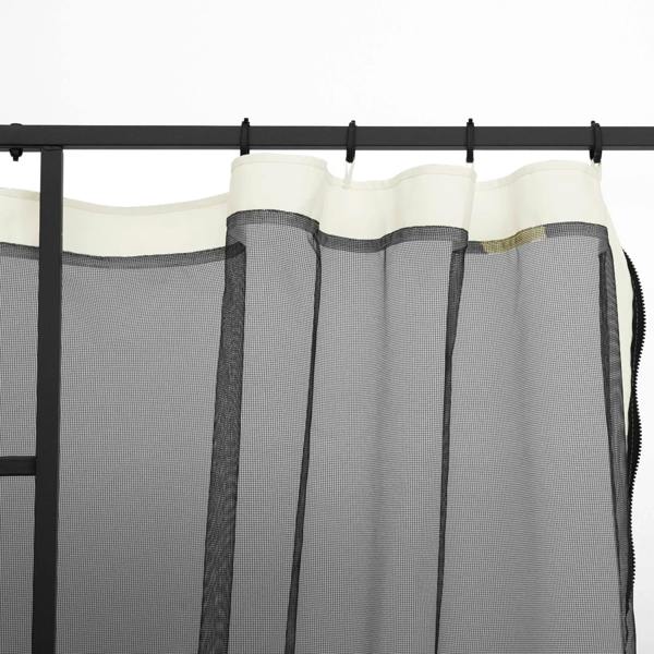 White mesh sidewall netting panels hanging from top rail with evenly spaced hooks
