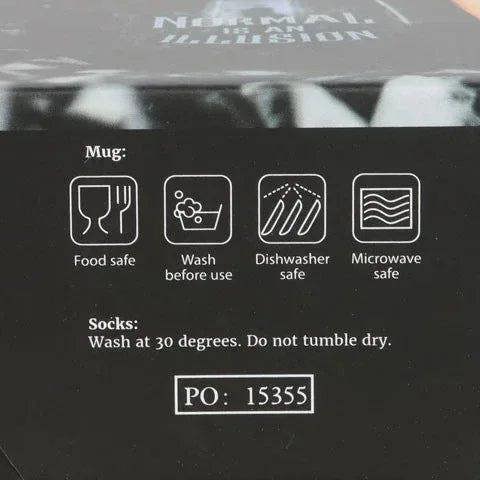 Mug and socks care label: wash socks at 30°C; do not tumble dry