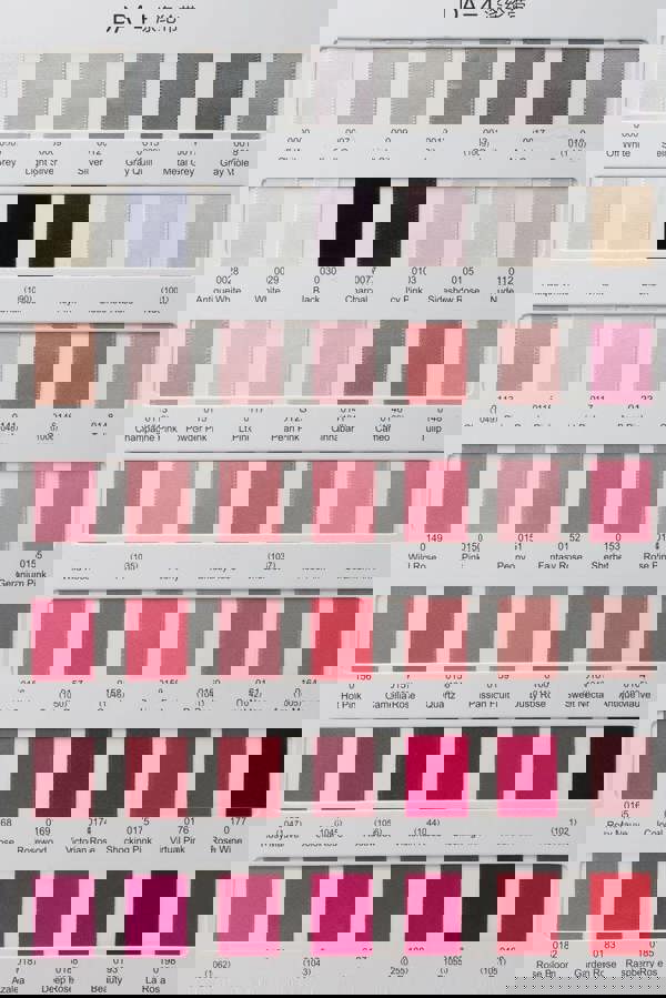 Color swatch chart with various shades of gray, pink, and red.