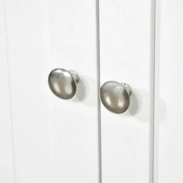 White cabinet doors with round silver knobs, double-door front hardware detail