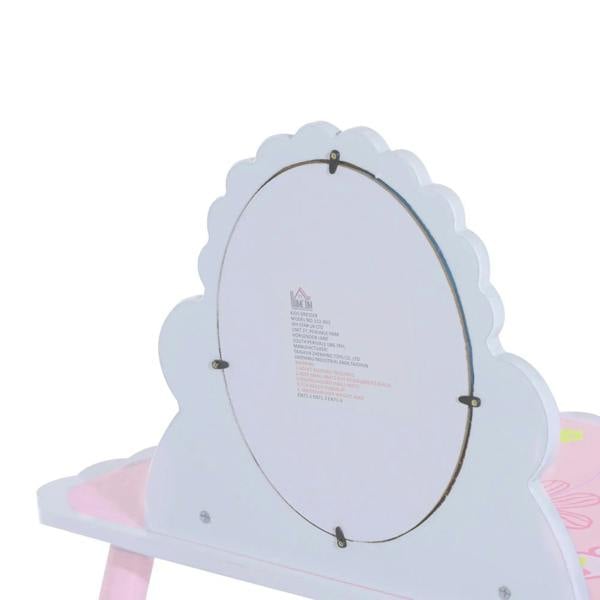 Oval vanity mirror back with mounting points on a pink kids dressing table