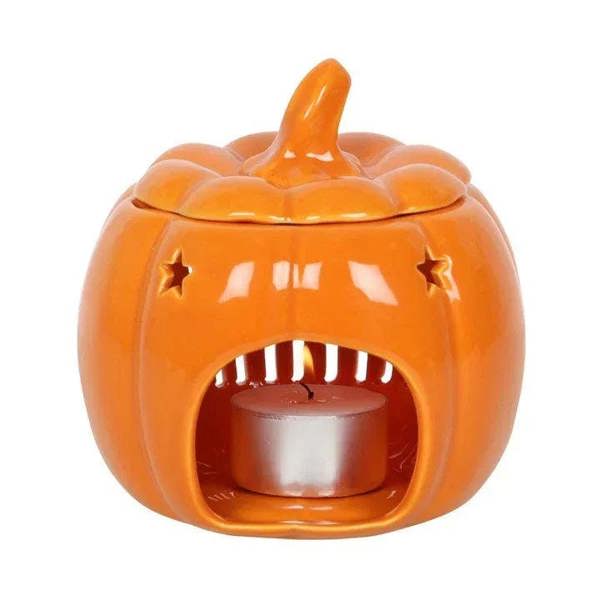 Orange pumpkin oil burner with front cutout design and inner metal cup