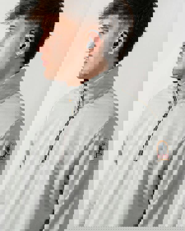 close up shot of a model wearing a Parajumpers Broad Peak Mens 1/4 Zip Sweatshirt in Fresh Grey 271