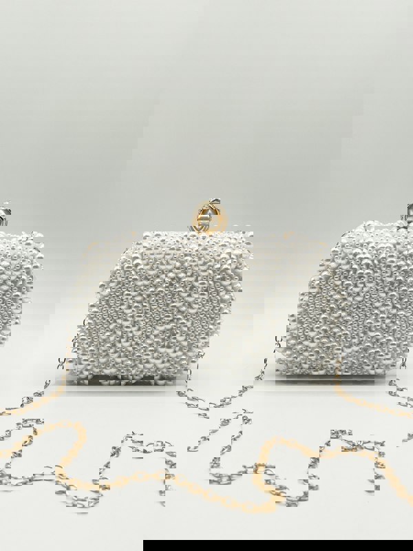 SVNX White Pearl beaded clutch bag