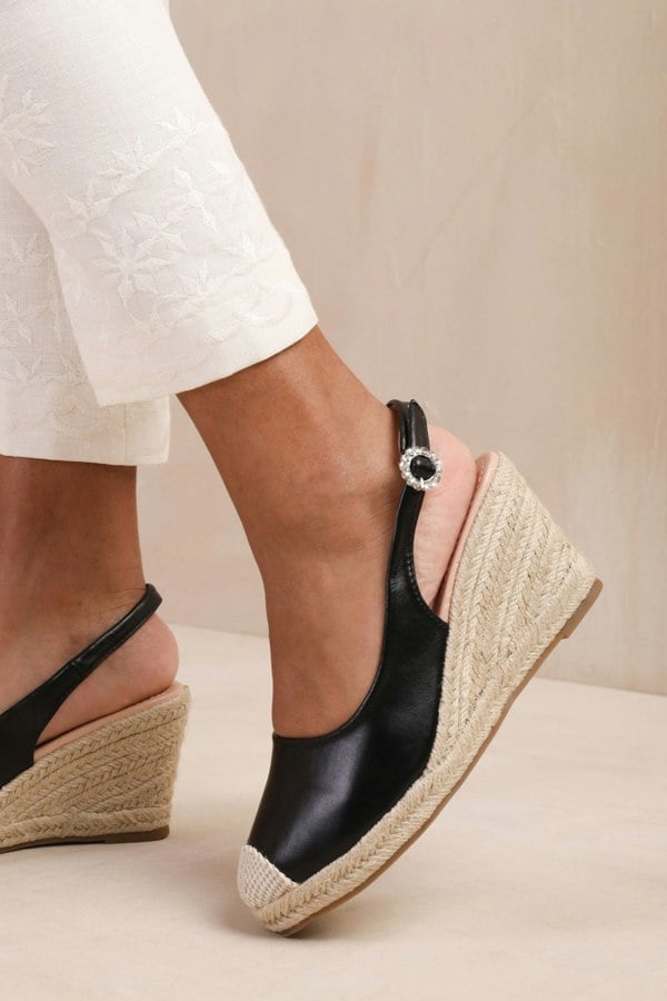 Where's That From Nevada Slingback With Diamante Flower Buckle Espadrille Wedges in Black Faux Leather