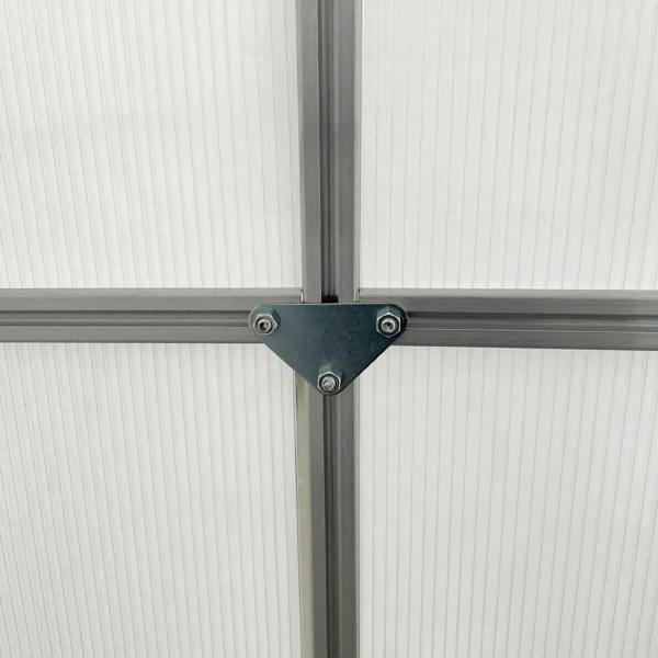 Corner joint with metal connector plate and bolts for greenhouse panel frame