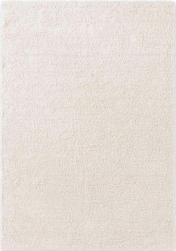 Beige rug with a subtle pattern on a white background