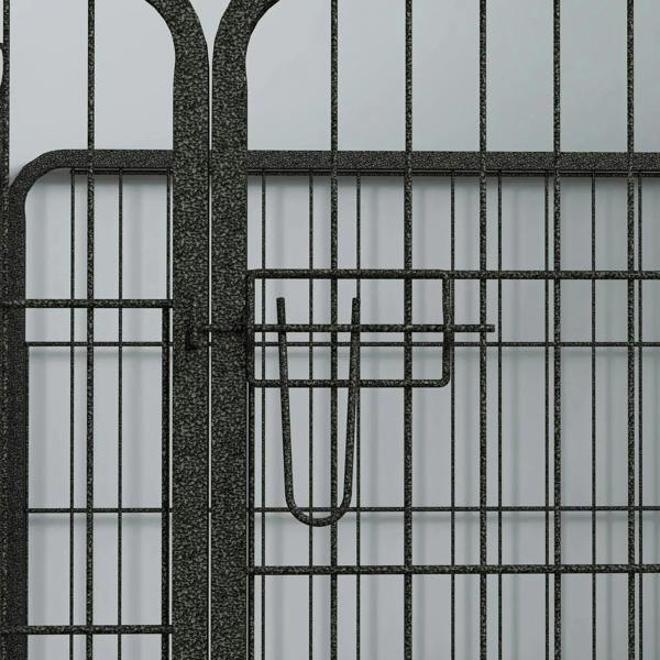 Close-up of grey wire dog playpen latch and door bar detail