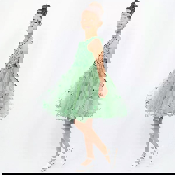 pretty model swirling in sage Green Party dress