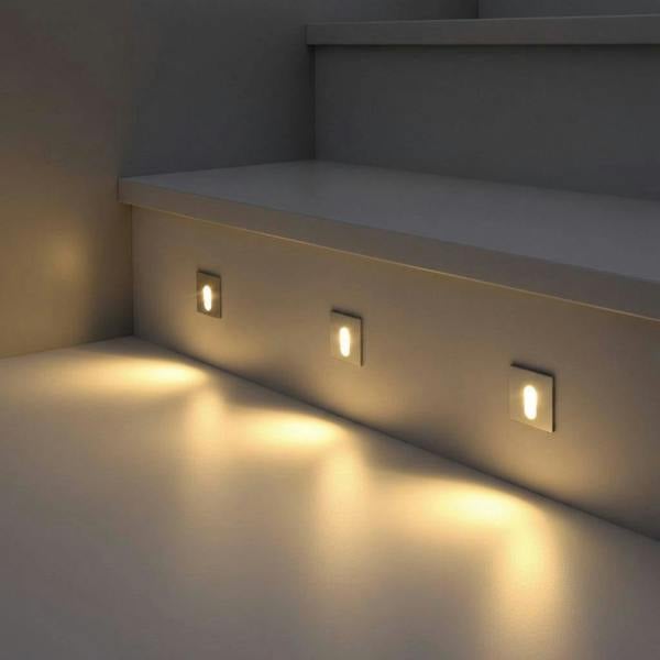 silver lights for staircase wall mounted in a stair riser in a home