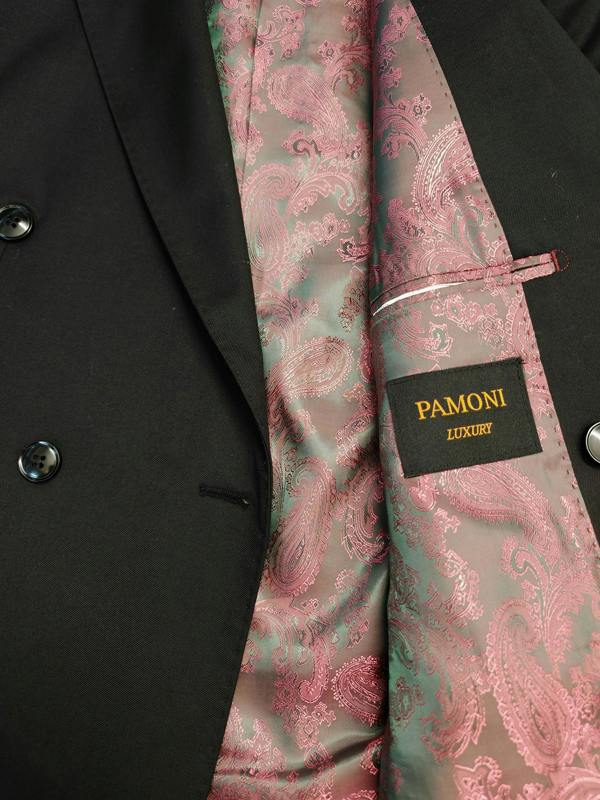 Close-up of a black suit jacket with a pink and green paisley patterned lining. A black brand label reading 'PAMONI LUXURY' is visible on the lining.