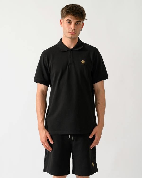 model wearing a Belstaff Mens Logo Polo in Black