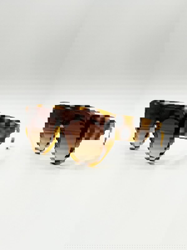 SVNX Oversized Flat Top Spotty sunglasses in Brown