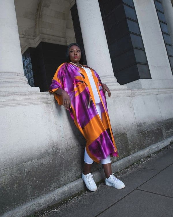  Womens Bird of Paradise Pink Purple Plus Size and Mid Size Silk Kimono styled with a white top and white jeans, creating a fresh ensemble.