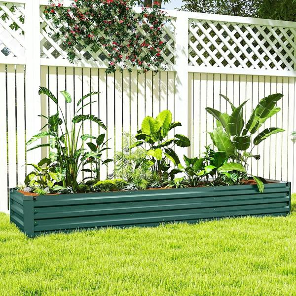 Green galvanized steel rectangular garden bed with planted foliage, open top.
