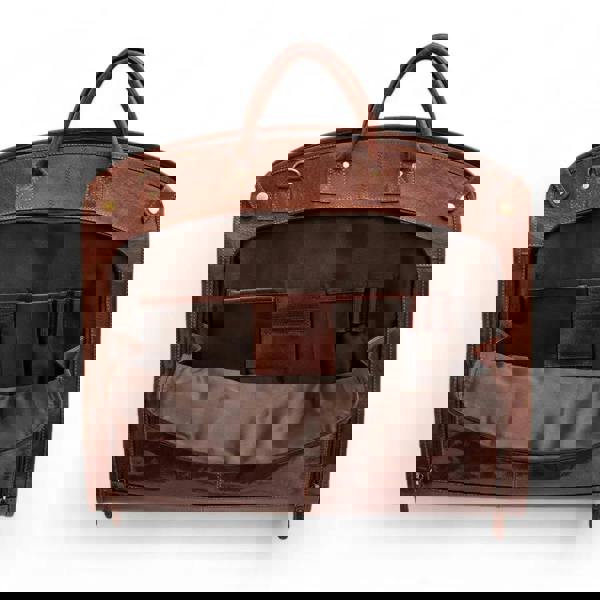 Cognac leather garment bag with interior compartments on a white background