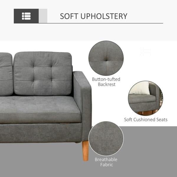 Grey fabric sofa with button-tufted backrest and soft cushioned seat